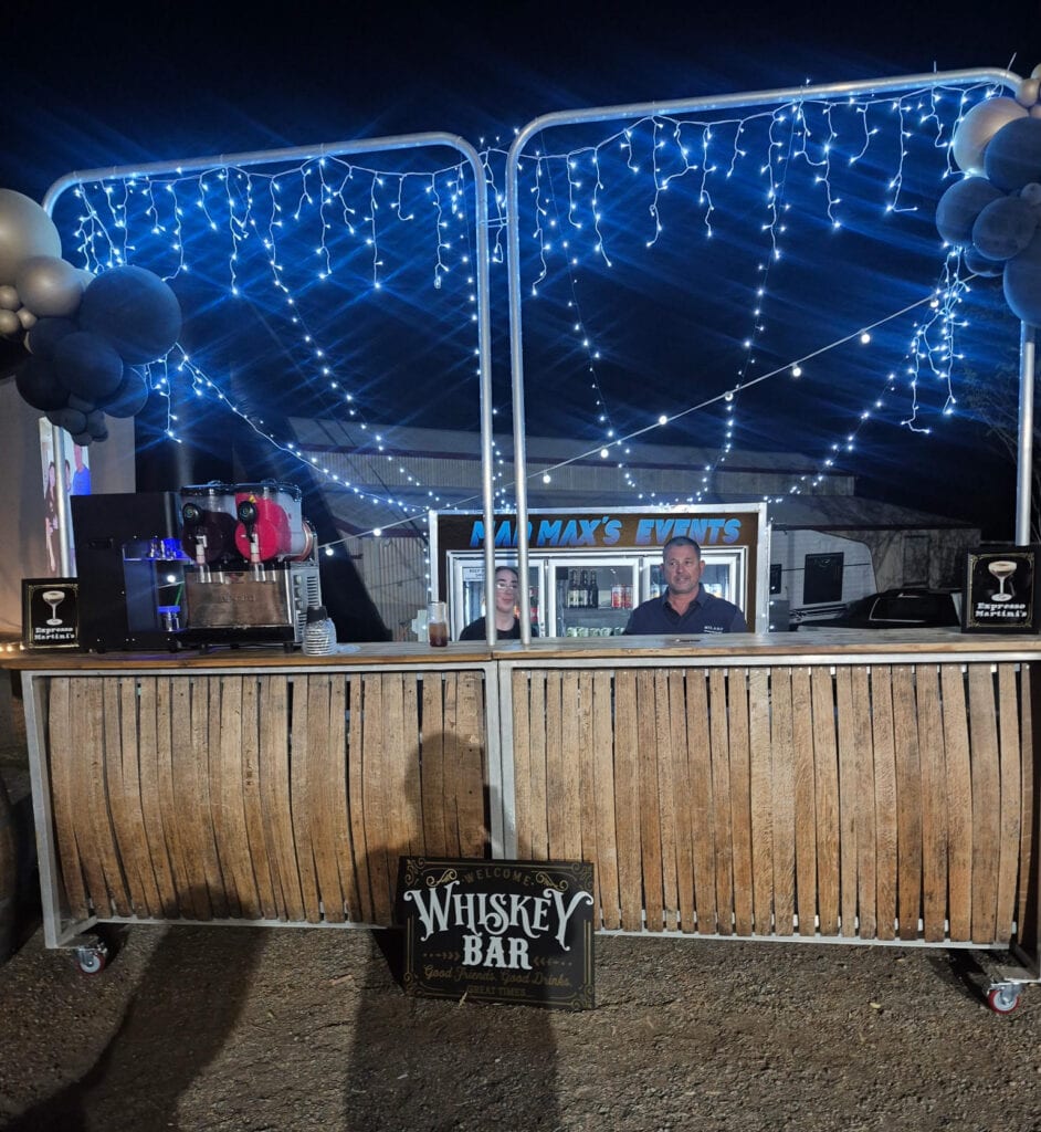 Mobile bar hire setup at night with string lights for an event in Perth WA